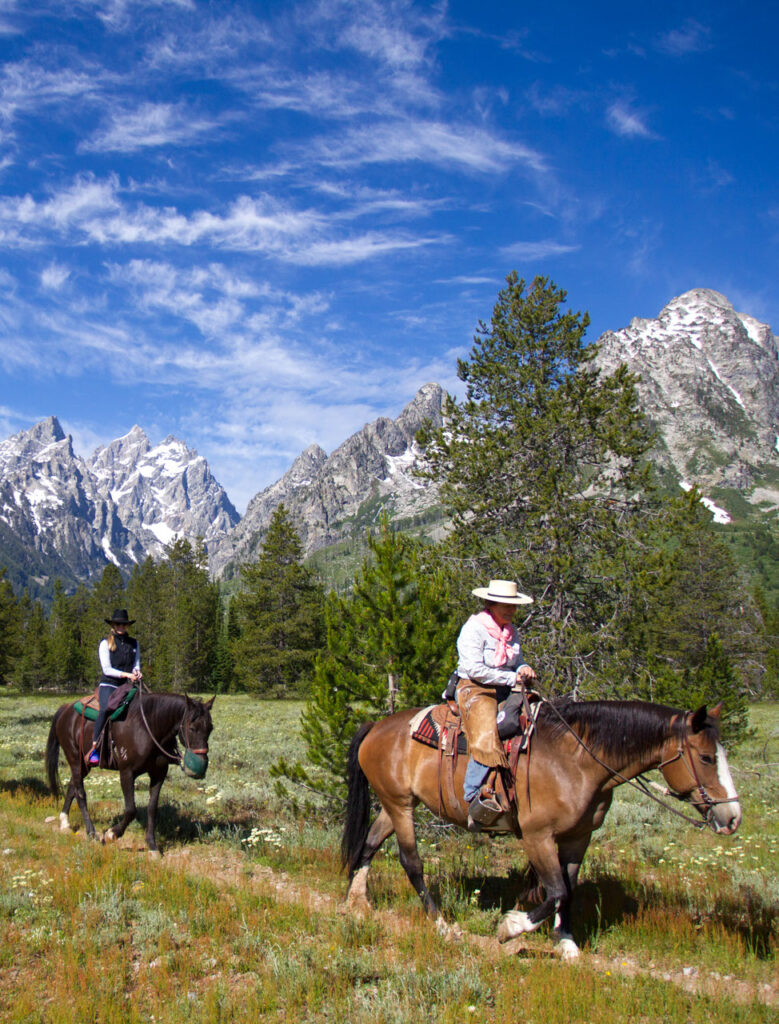 Two people riding hoses in Grand Teton National Park